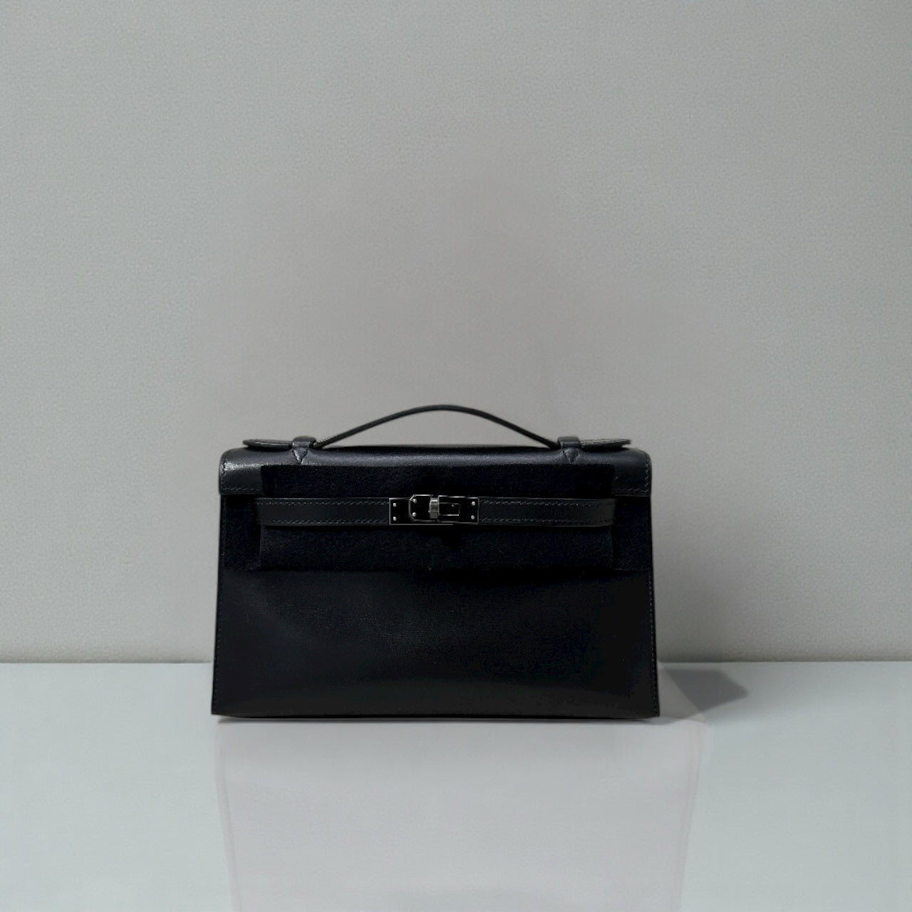 Hermès Limited Edition So-Black Mini Kelly Pochette Box Calf Leather